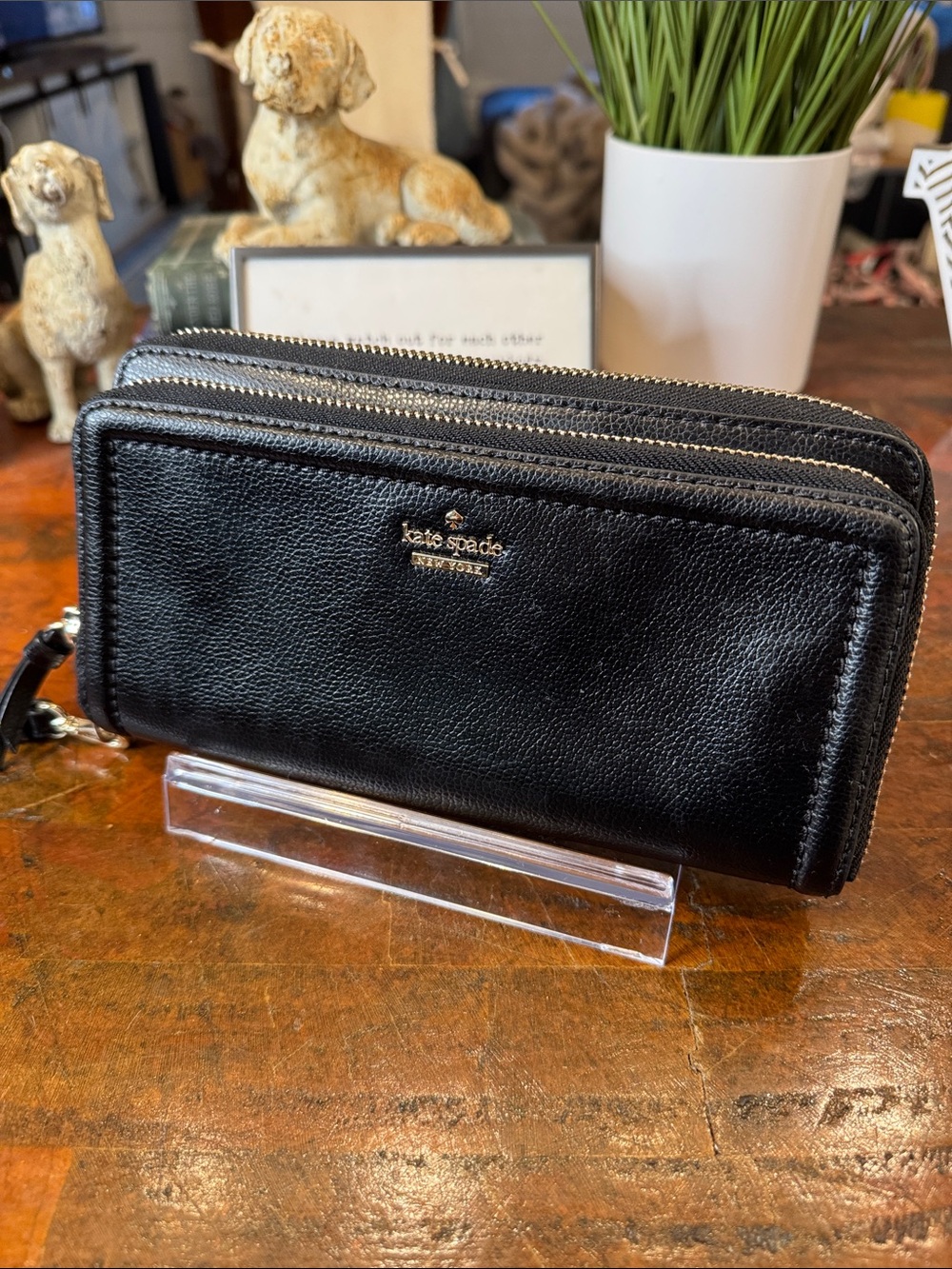 kate spade black leather wristlet with gold logo